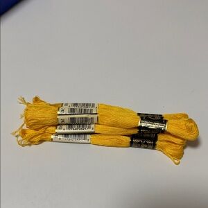 7 DMC (color 743) Bright Yellow Embroidery Floss